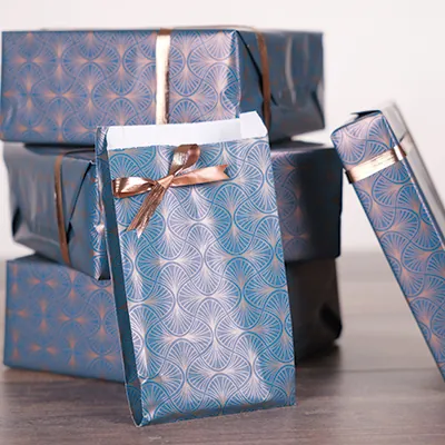 Papier cadeau bleu pétrole / cuivre Wendy 70cmx50m 60g/m² - Papier cadeaux couchés à motifs-6