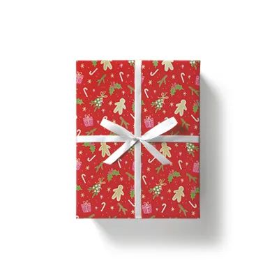 Papier cadeau couché rouge motifs Noël vert 70 cm x 50 m 80 g/m² – le rouleau - Papier cadeaux couchés à motifs-1