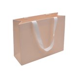 Sacs pelliculés unis rose pastel à poignées ruban – 32 x 11 x 25 cm – paquet de 10