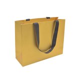 Sacs pelliculés or à poignées ruban noires – 32 x 11 x 25 cm – Paquet de 10