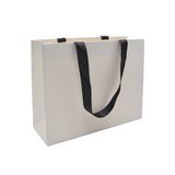 Sacs pelliculés blancs à poignées ruban noires – 38 x 12 x 28 cm – Paquet de 10