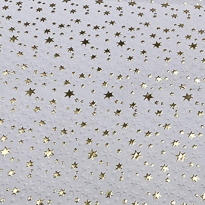 Papier cadeau à effets blanc embossé étoiles dorure à chaud 70 cm x 50 m 80 g/m² – le rouleau - Papiers cadeaux à effets